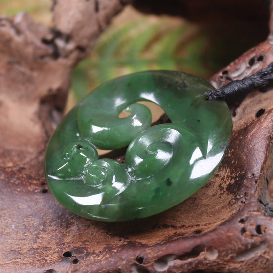Koru pendant carved from Kawakawa Pounamu - NZ Greenstone
