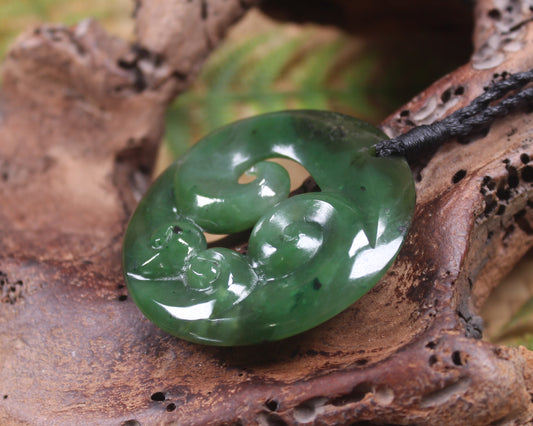 Koru pendant carved from Kawakawa Pounamu - NZ Greenstone