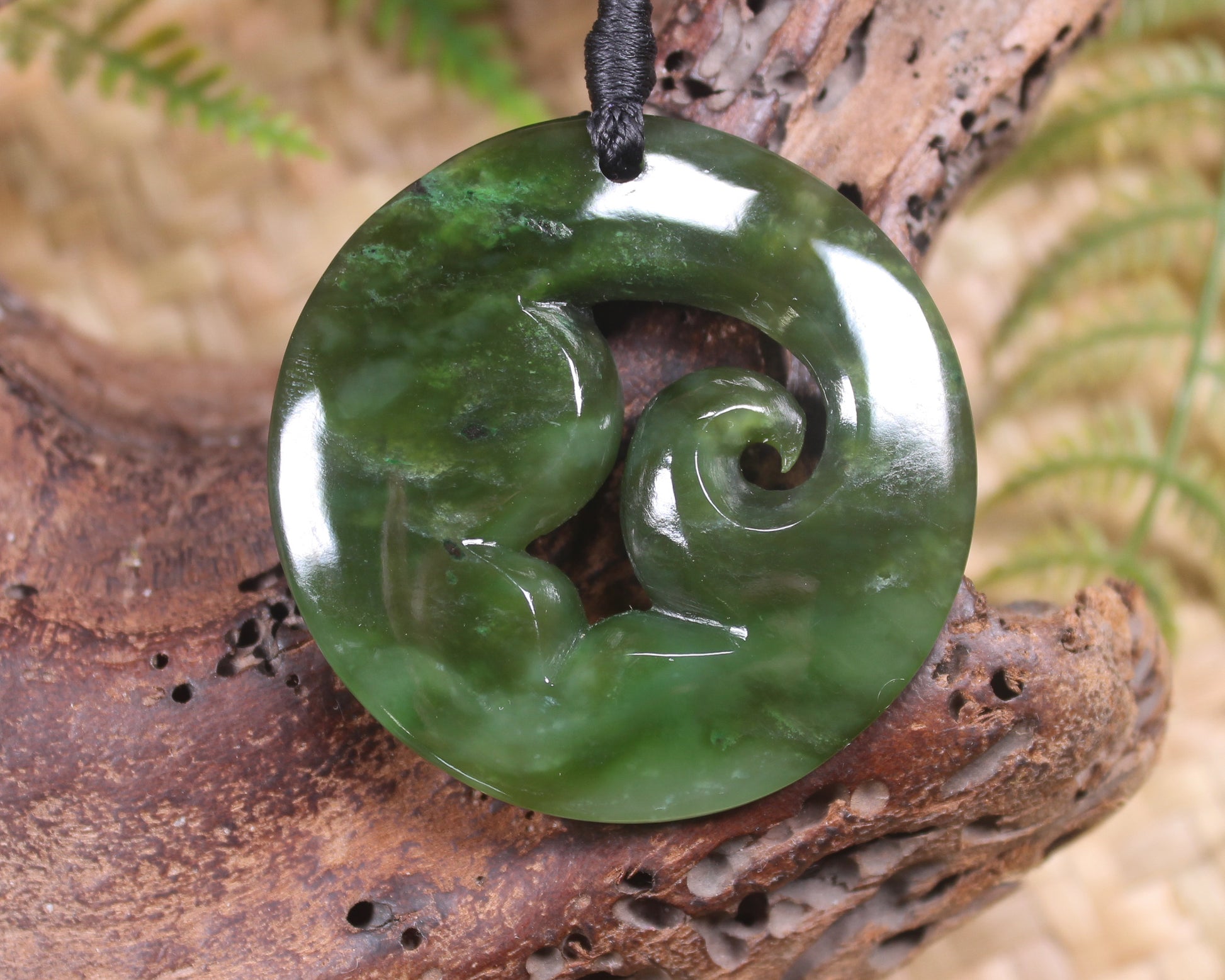 Koru carved from Rimu Pounamu - NZ Greenstone