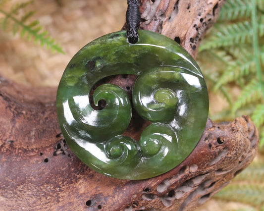 Koru carved from Rimu Pounamu - NZ Greenstone