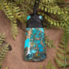 Turquoise with bronze composite toki and roimata pendant
