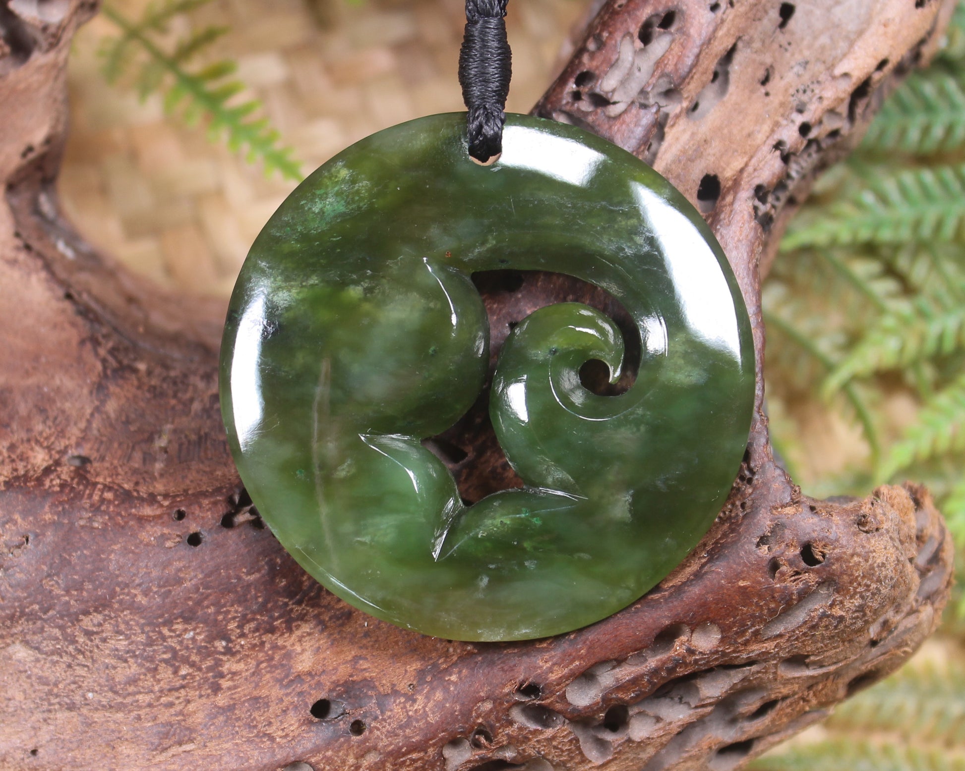 Koru carved from Rimu Pounamu - NZ Greenstone