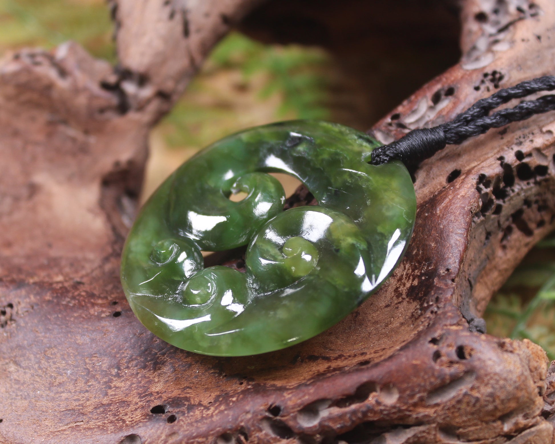 Koru carved from Rimu Pounamu - NZ Greenstone