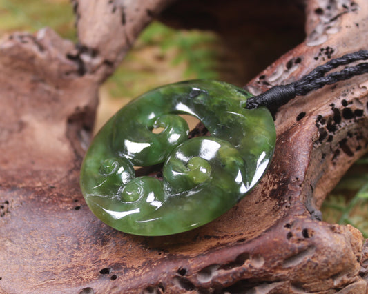 Koru carved from Rimu Pounamu - NZ Greenstone