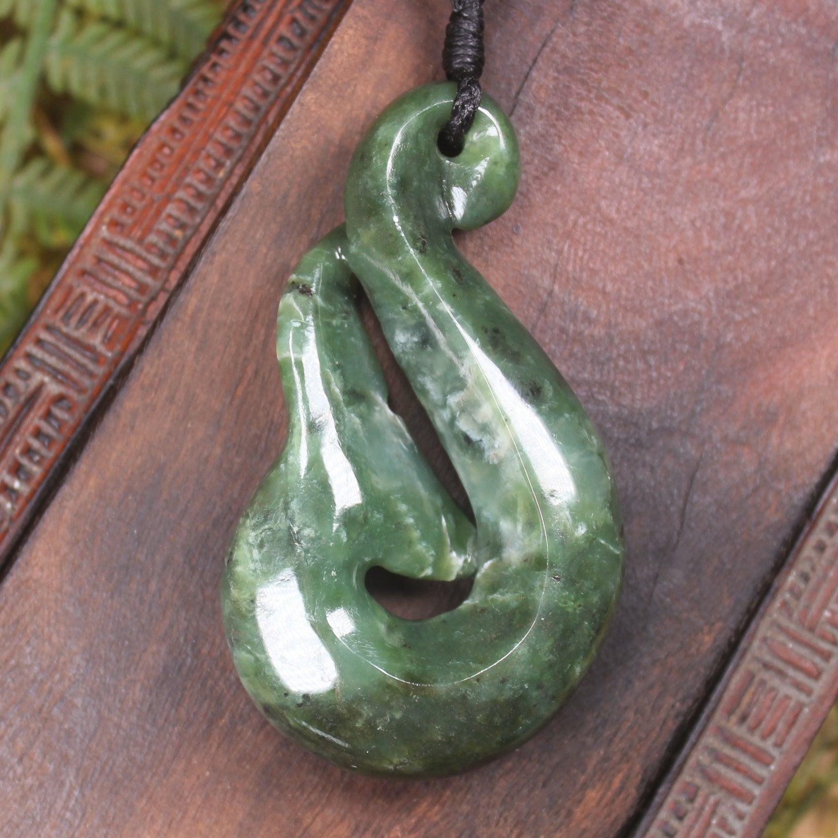 Whale tail carved from Hapopo Pounamu - NZ Greenstone