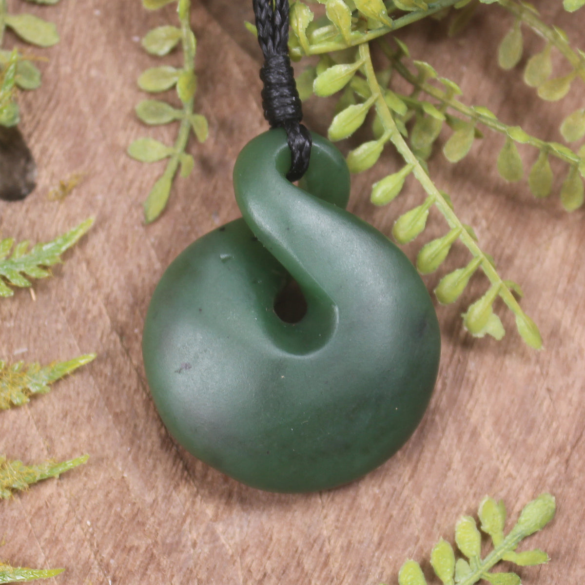 Twist or Pikorua carved from Hapopo Pounamu - NZ Greenstone
