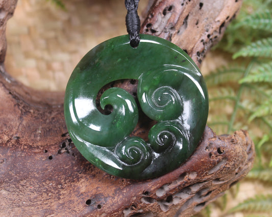 Koru pendant carved from Kawakawa Pounamu - NZ Greenstone