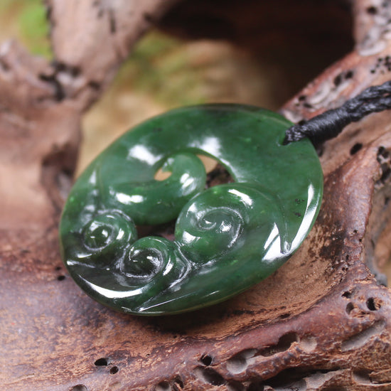 Koru pendant carved from Kawakawa Pounamu - NZ Greenstone