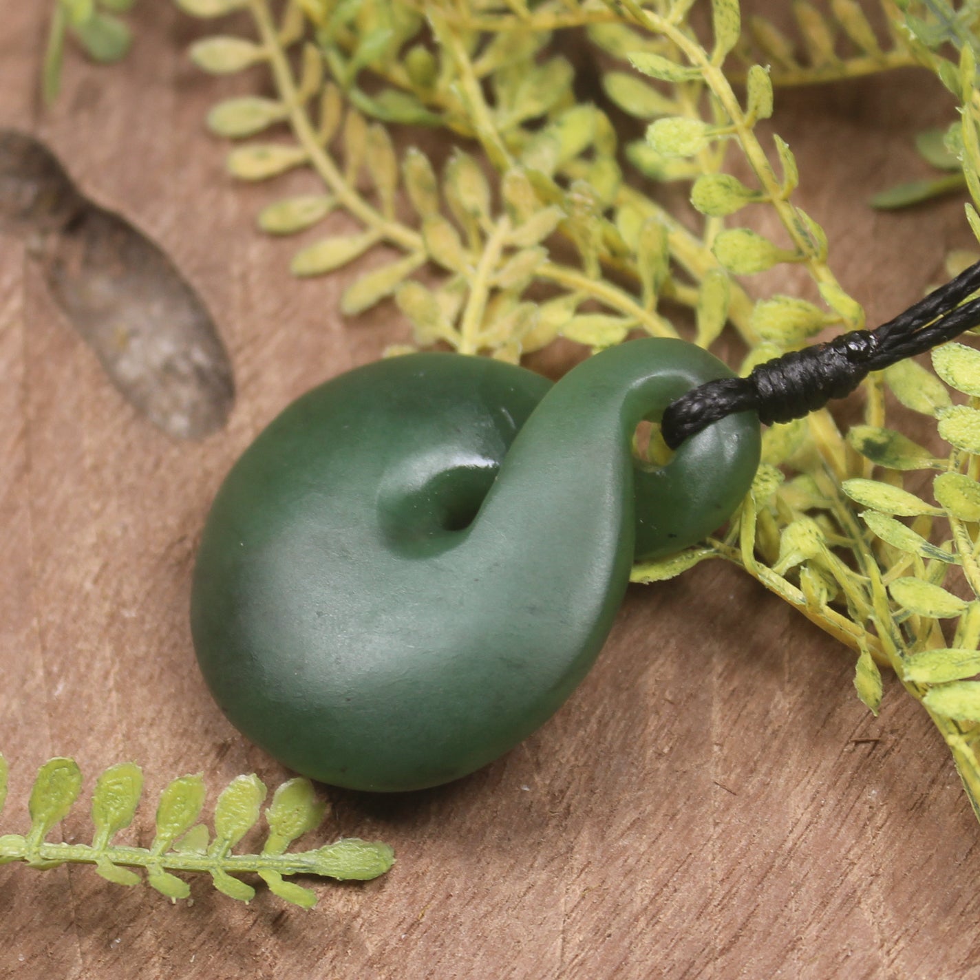 Twist or Pikorua carved from Hapopo Pounamu - NZ Greenstone