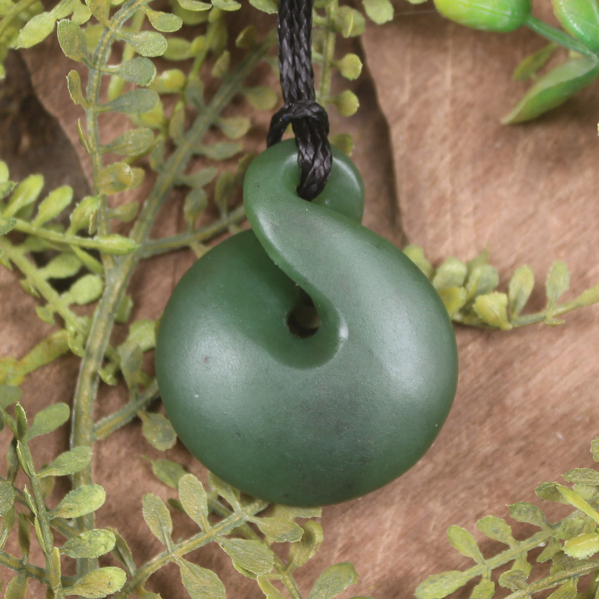 Twist or Pikorua carved from Hapopo Pounamu - NZ Greenstone