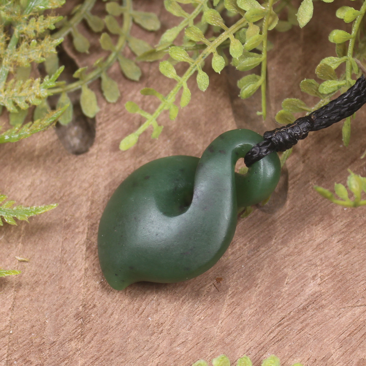 Twist or Pikorua carved from Hapopo Pounamu - NZ Greenstone