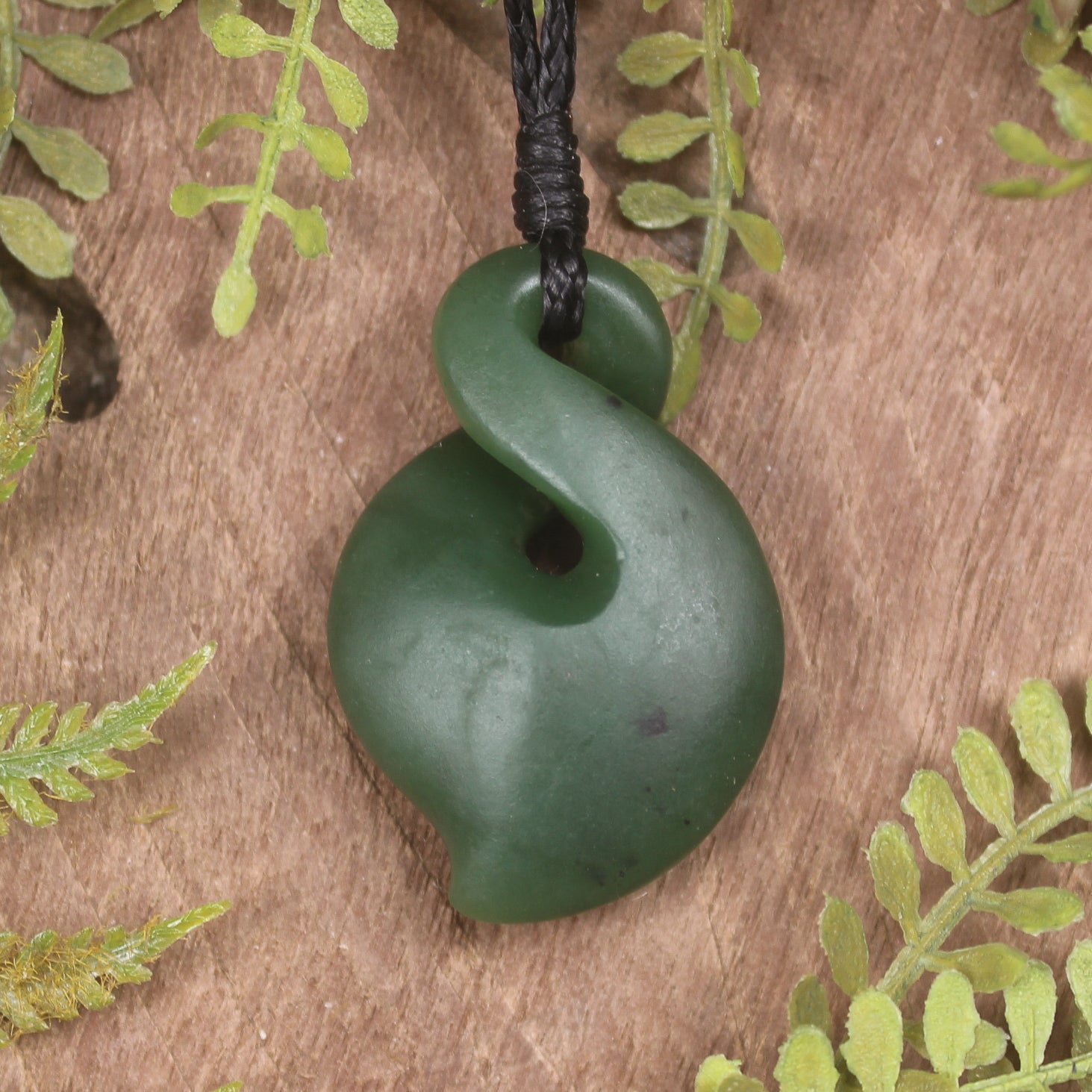 Twist or Pikorua carved from Hapopo Pounamu - NZ Greenstone