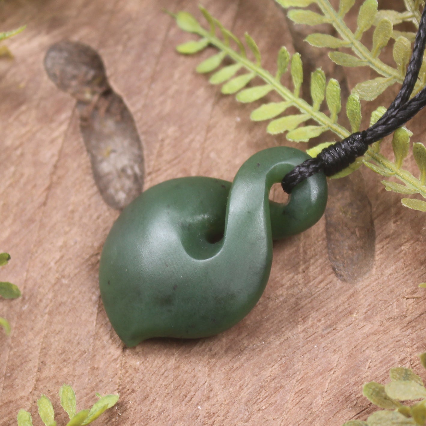 Twist or Pikorua carved from Hapopo Pounamu - NZ Greenstone