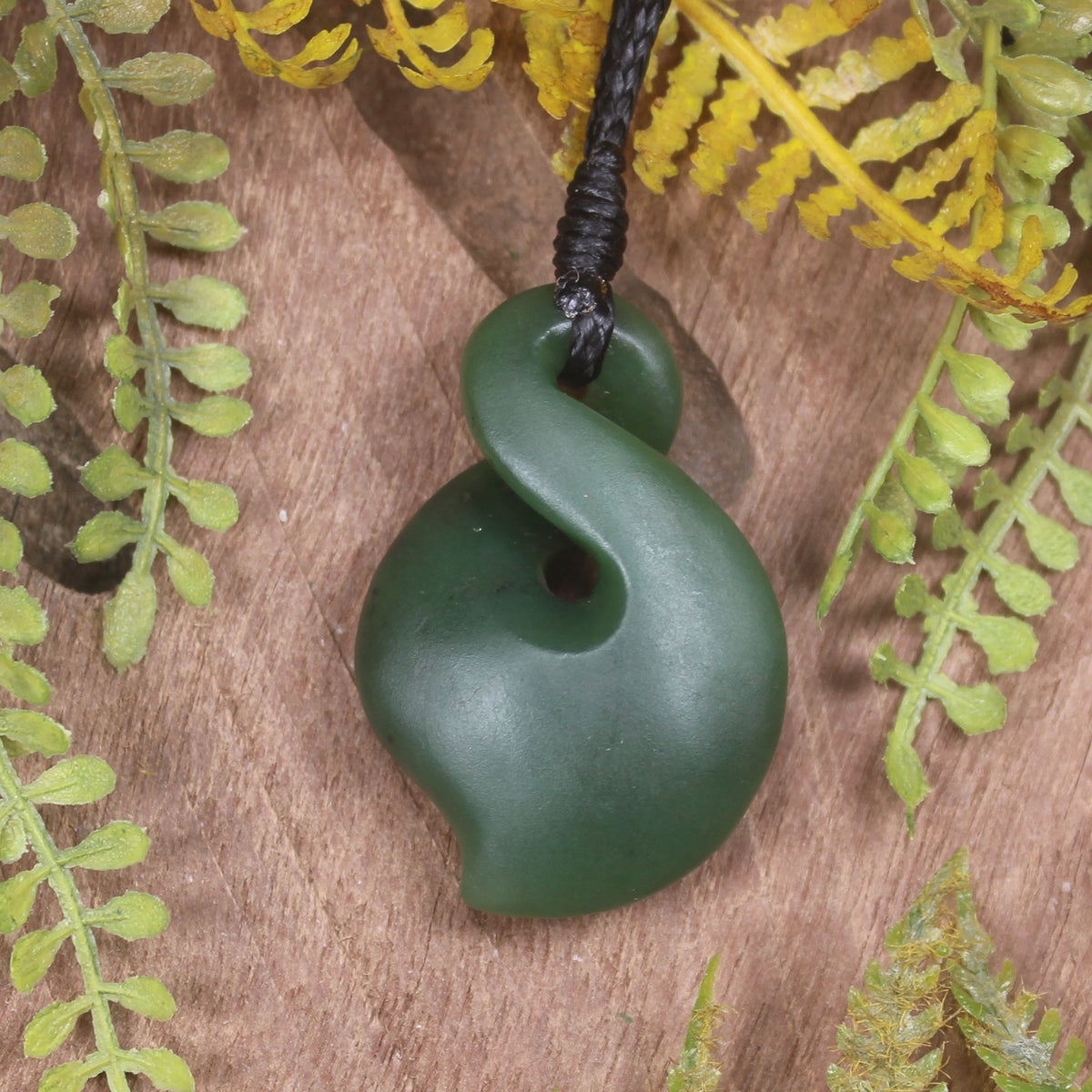 Twist or Pikorua carved from Hapopo Pounamu - NZ Greenstone