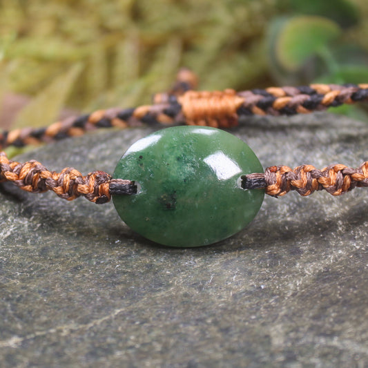 Adjustable cord bracelet with Kawakawa Pounamu