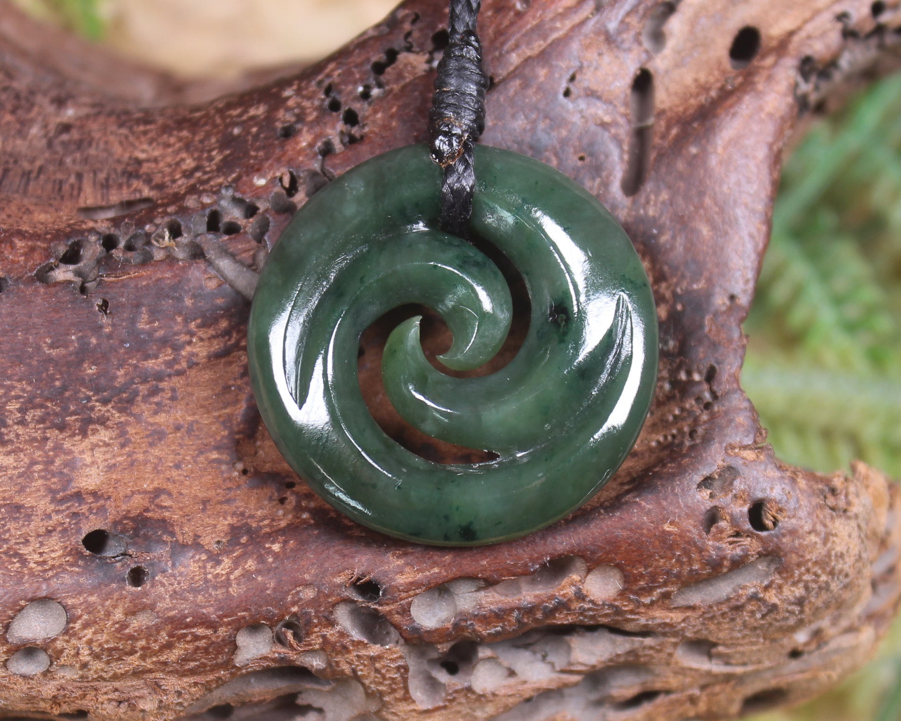 Koru pendant carved from Kawakawa Pounamu - NZ Greenstone