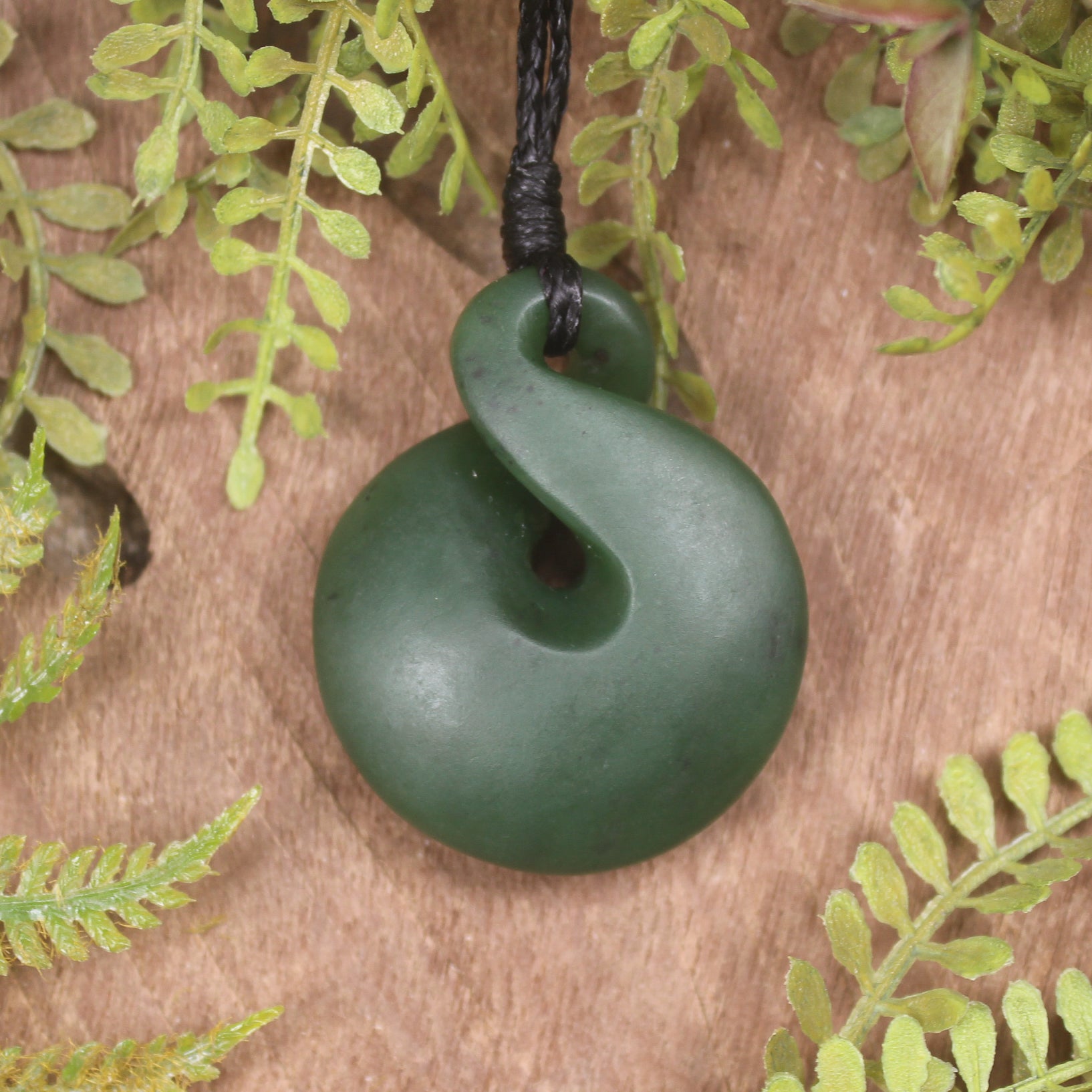 Twist or Pikorua carved from Hapopo Pounamu - NZ Greenstone