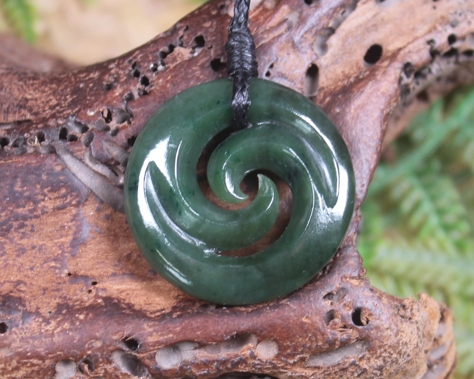 Koru pendant carved from Kawakawa Pounamu - NZ Greenstone