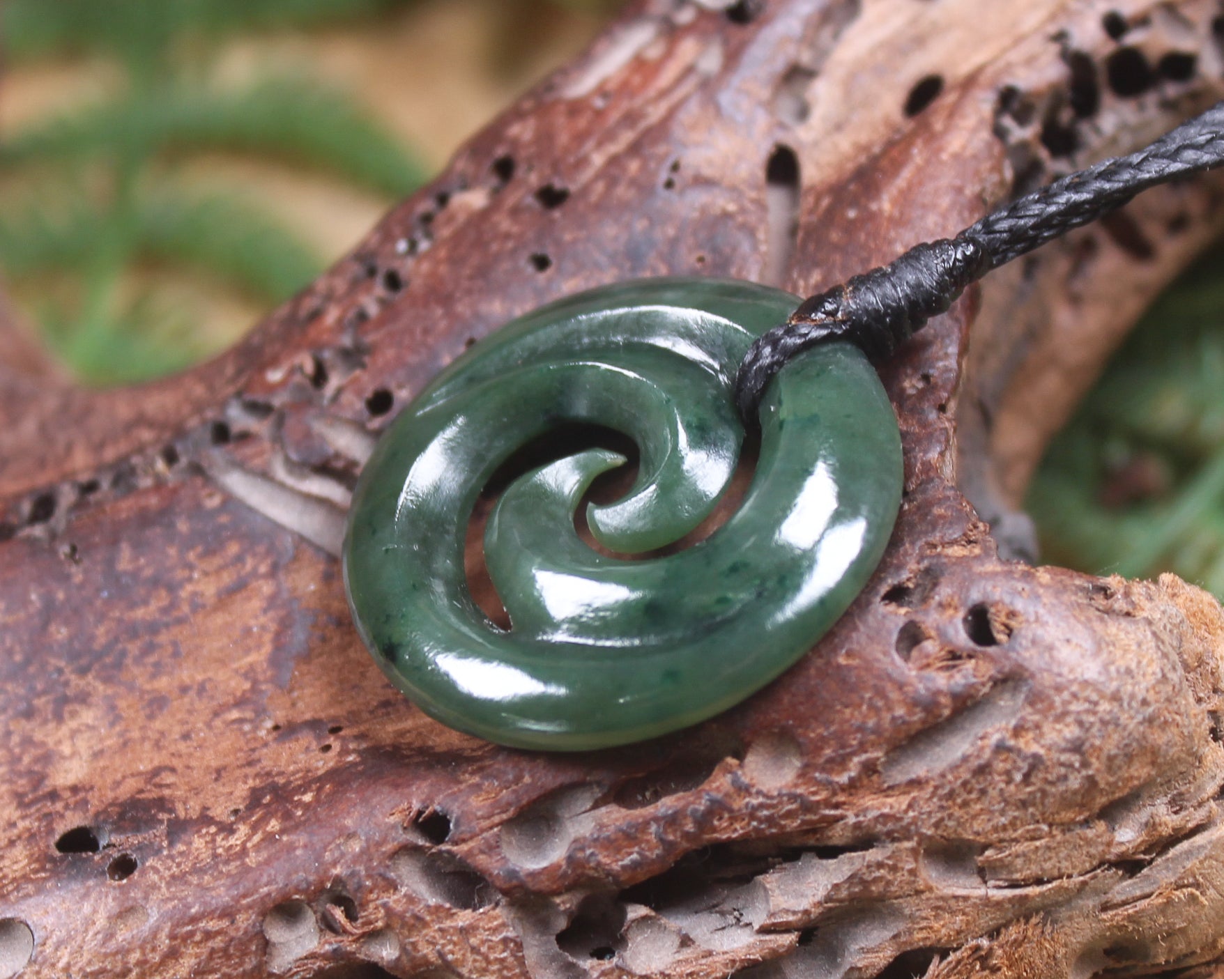 Koru pendant carved from Kawakawa Pounamu - NZ Greenstone