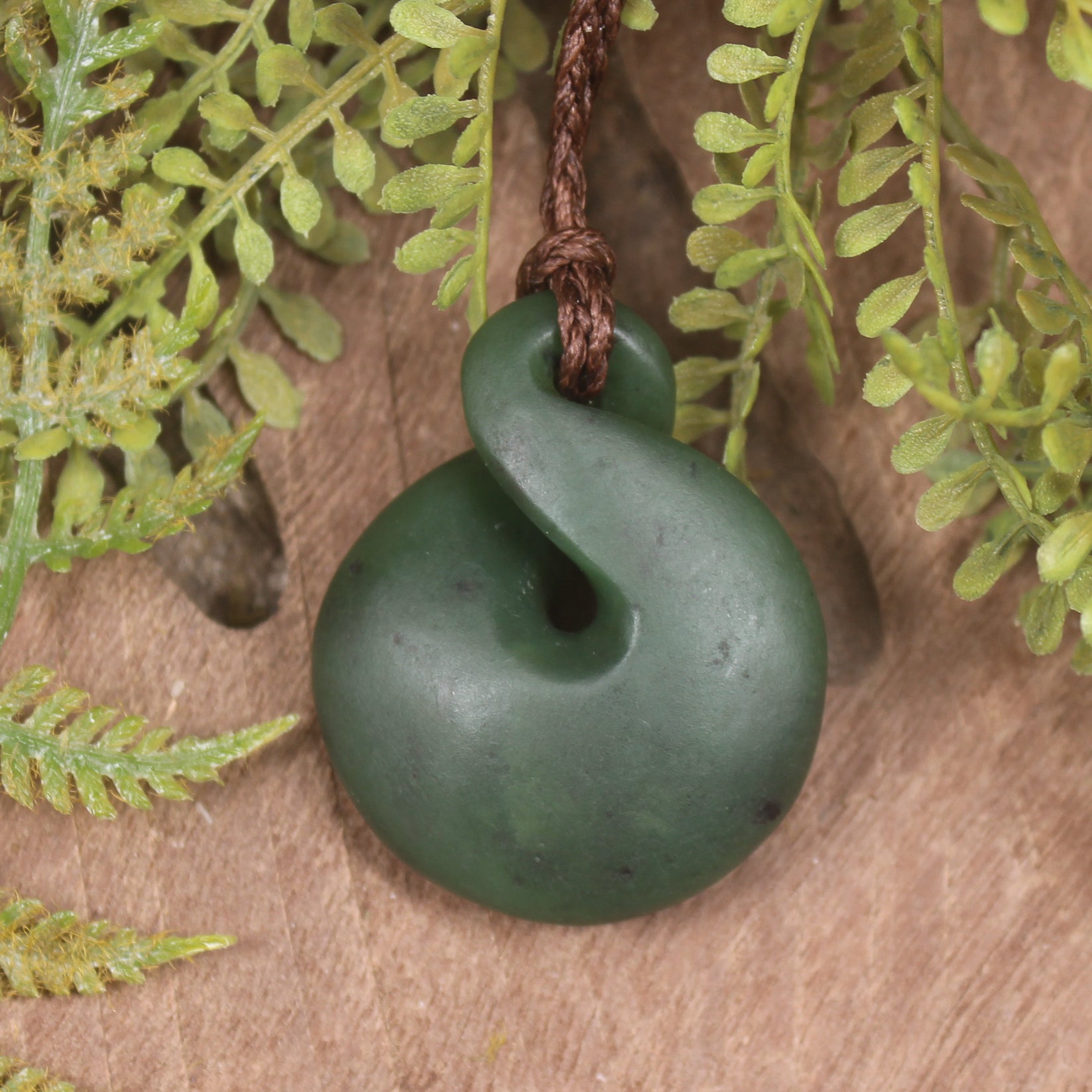 Twist or Pikorua carved from Hapopo Pounamu - NZ Greenstone