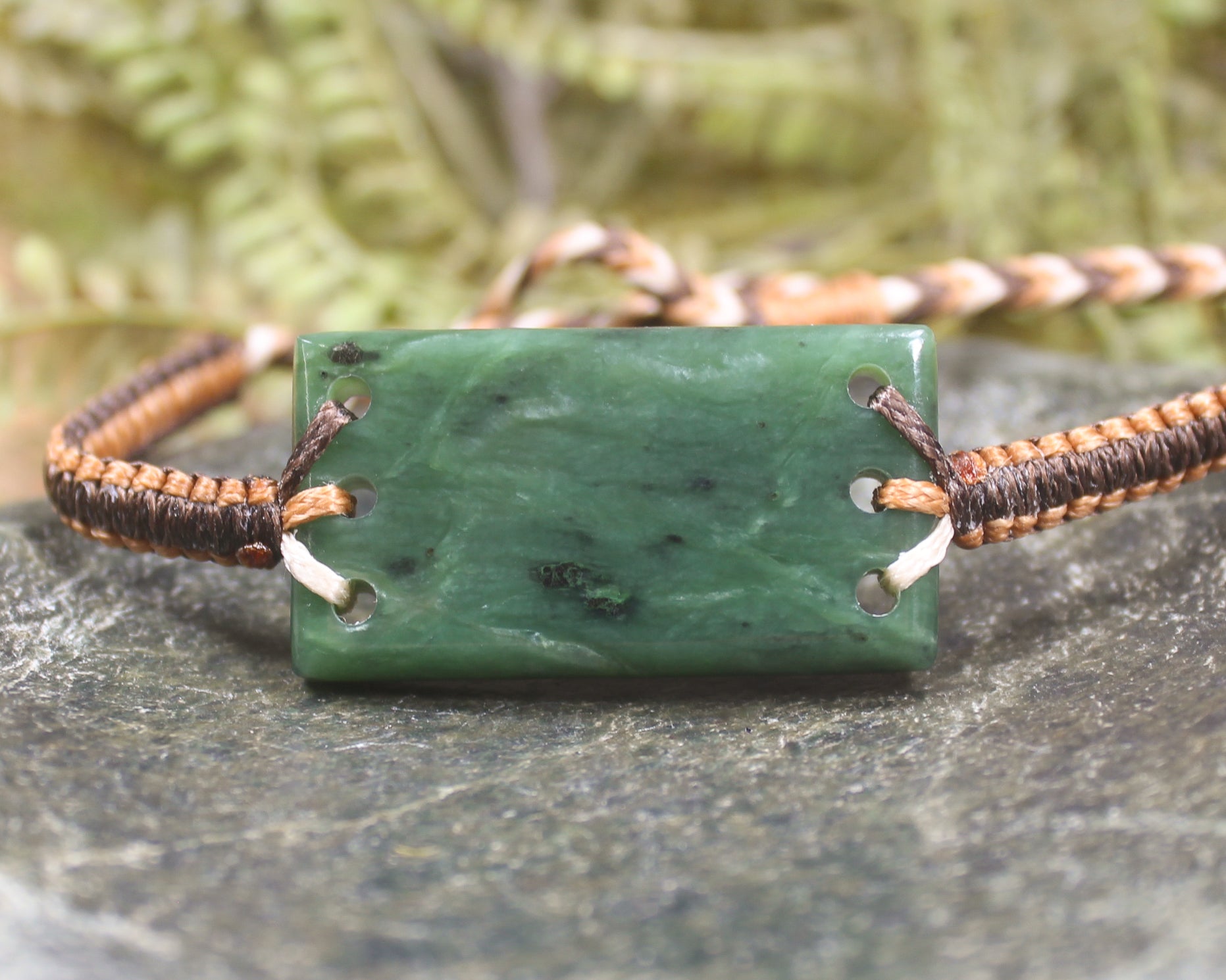 Adjustable cord bracelet with Hapopo Pounamu