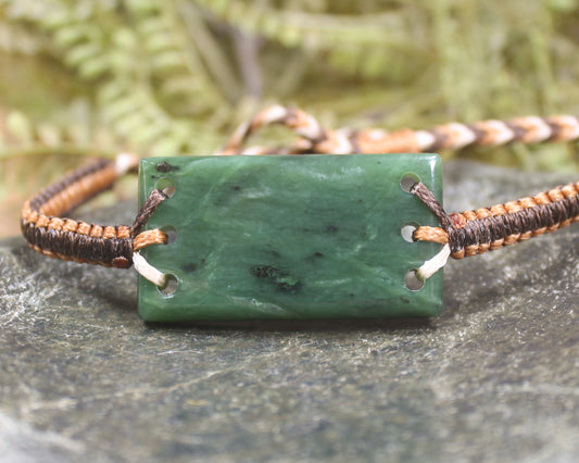 Adjustable cord bracelet with Hapopo Pounamu