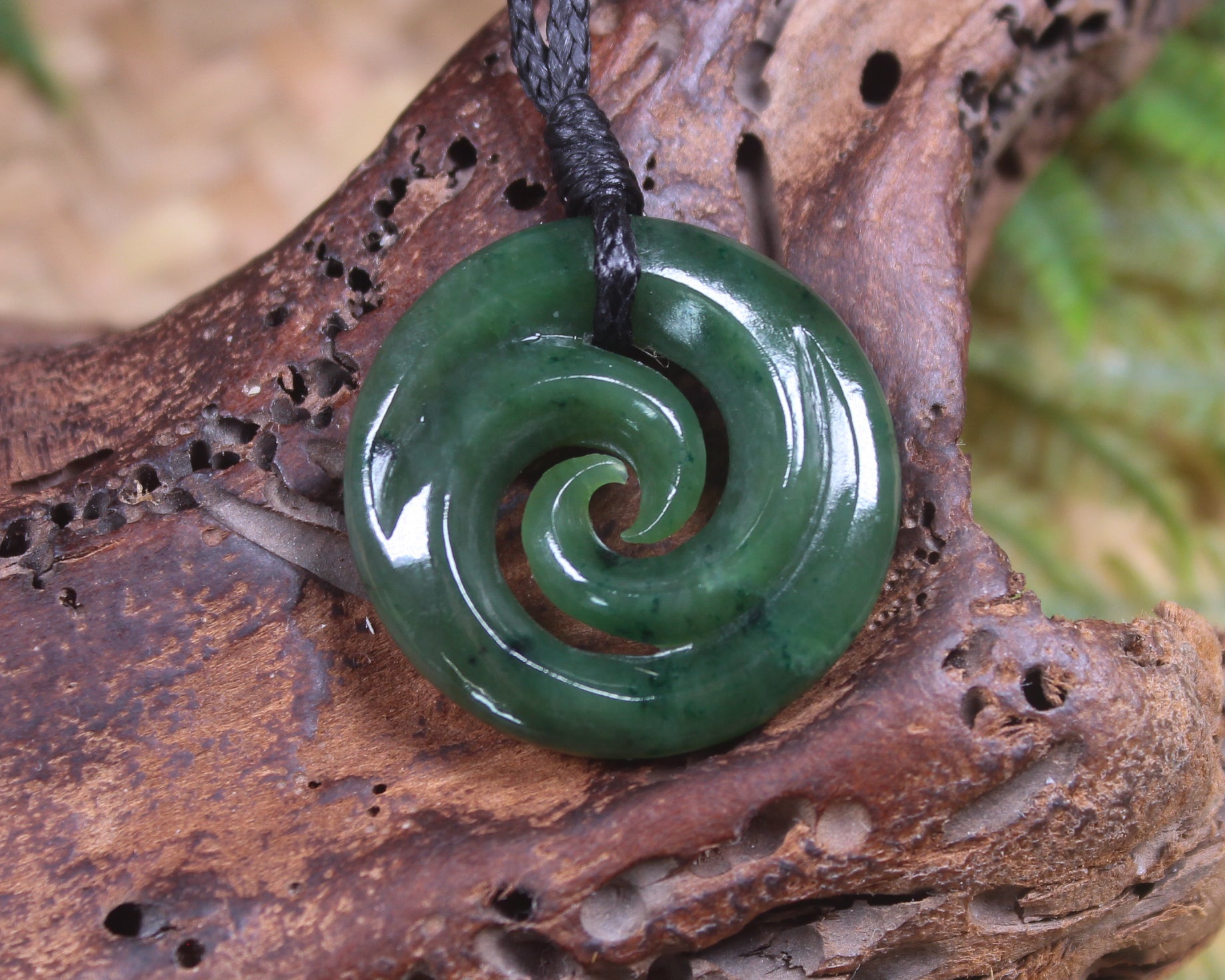 Koru pendant carved from Kawakawa Pounamu - NZ Greenstone