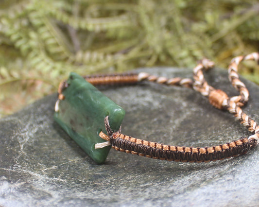 Adjustable cord bracelet with Hapopo Pounamu