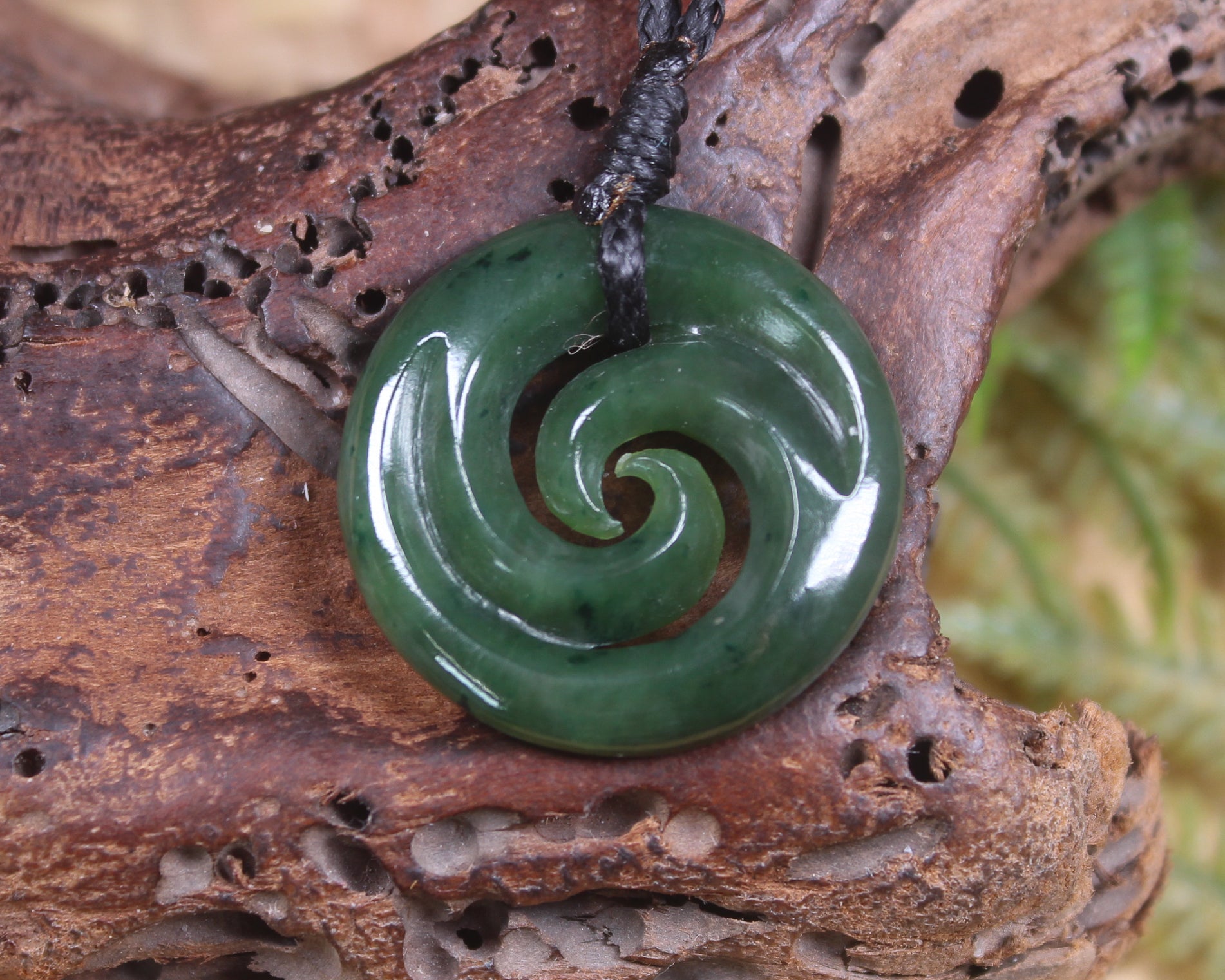 Koru pendant carved from Kawakawa Pounamu - NZ Greenstone