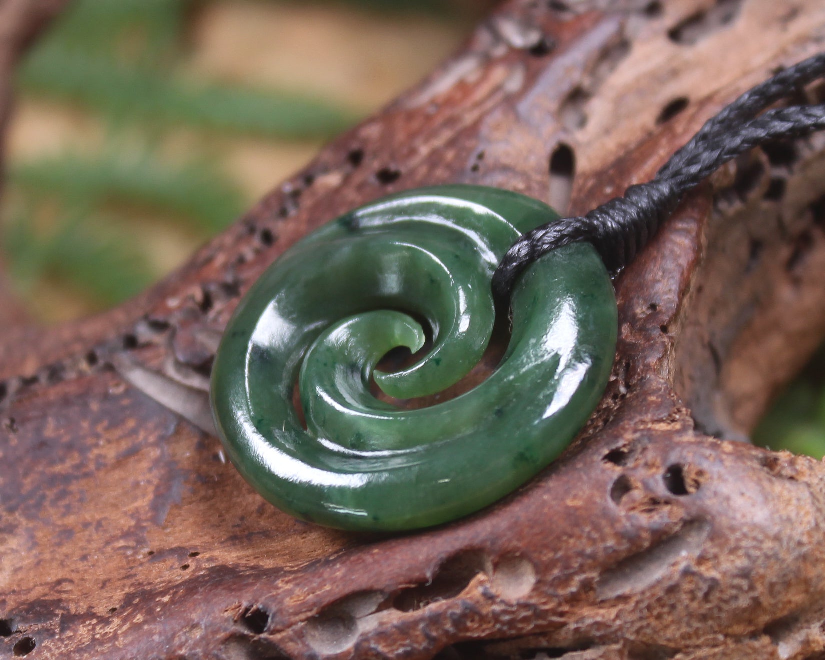 Koru pendant carved from Kawakawa Pounamu - NZ Greenstone