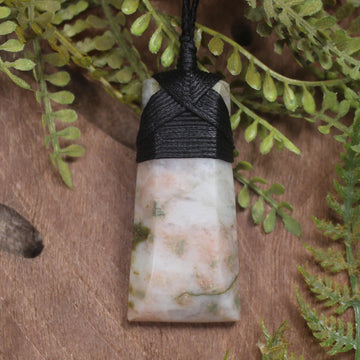 Thulite in quartz toki pendant