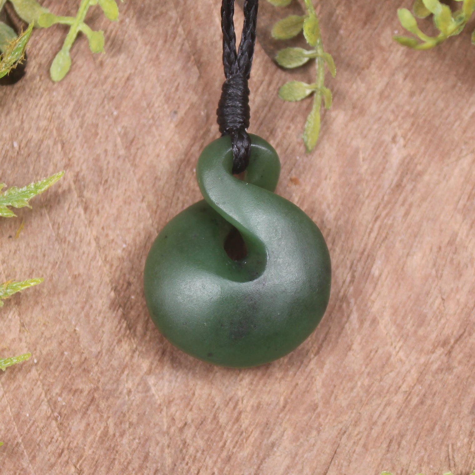 Twist or Pikorua carved from Hapopo Pounamu - NZ Greenstone