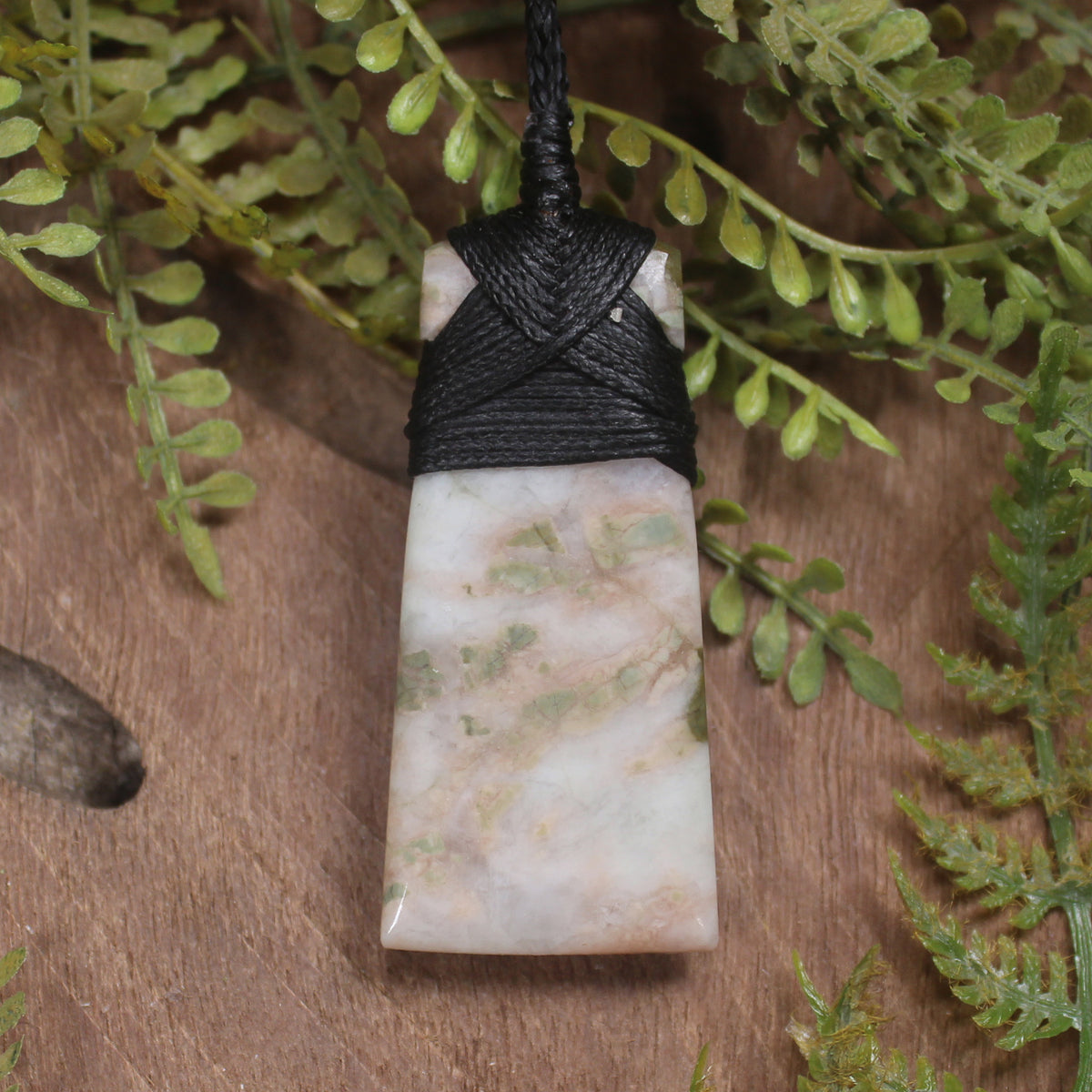Thulite in quartz toki pendant