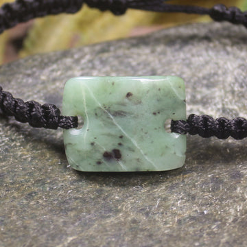 Adjustable cord bracelet with Hapopo Pounamu