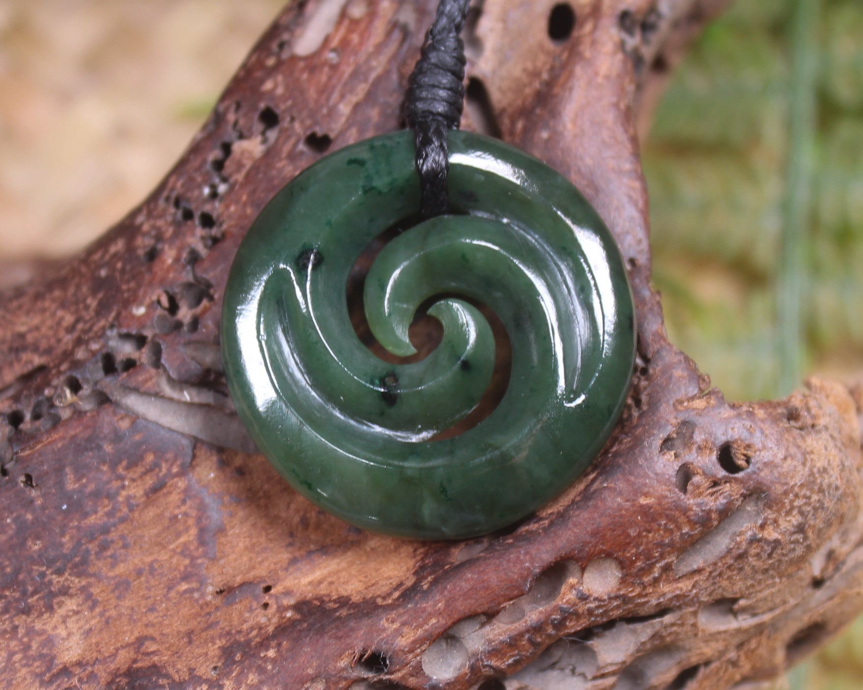 Koru pendant carved from Kawakawa Pounamu - NZ Greenstone