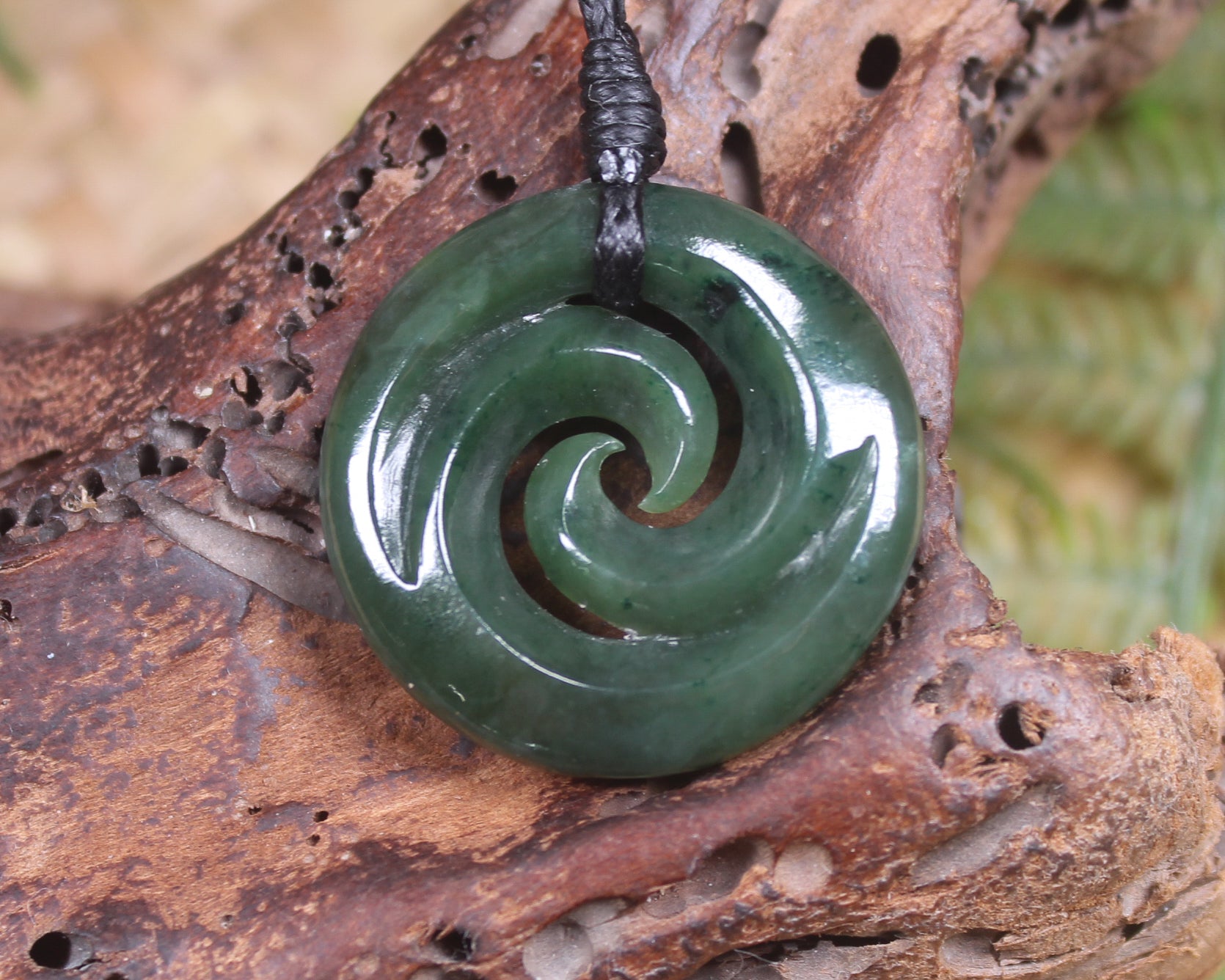 Koru pendant carved from Kawakawa Pounamu - NZ Greenstone