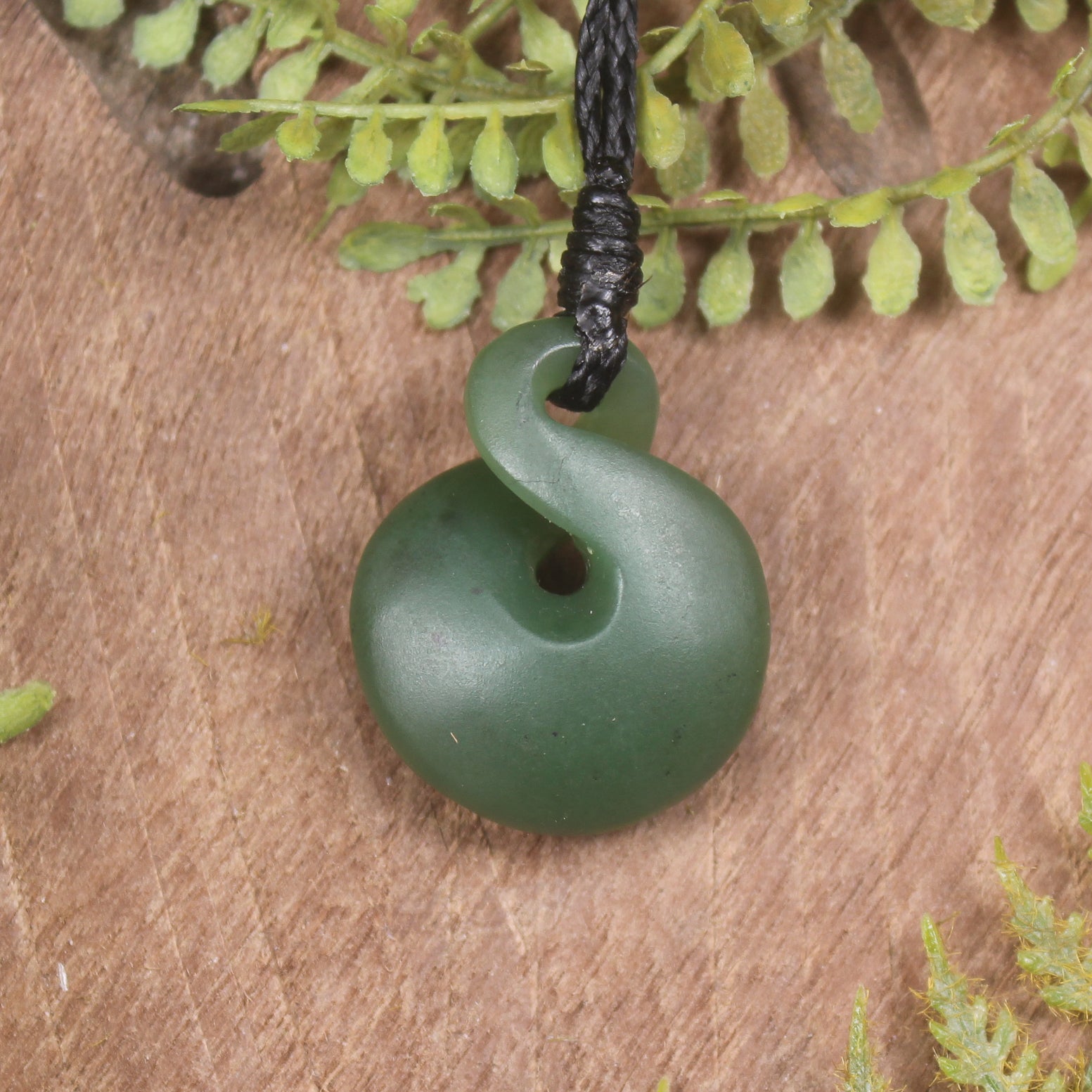 Twist or Pikorua carved from Hapopo Pounamu - NZ Greenstone