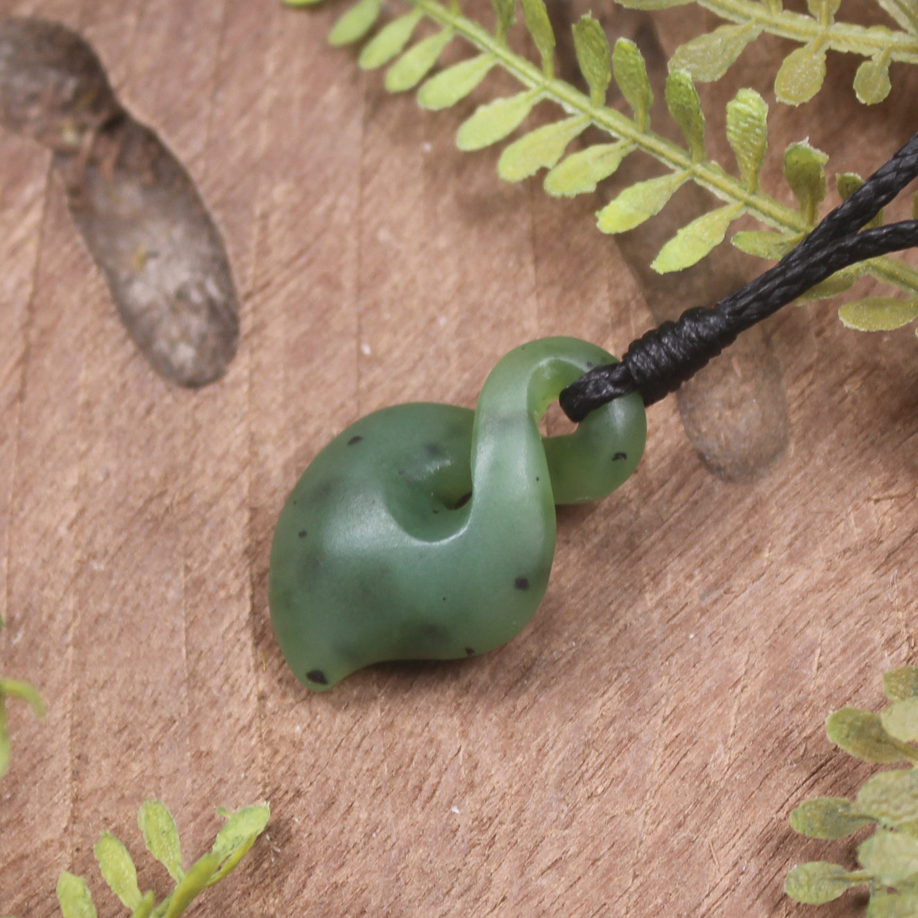 Twist or Pikorua carved from Hapopo Pounamu - NZ Greenstone