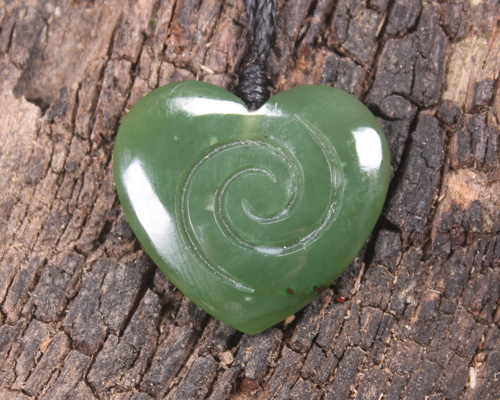 Koru Heart pendant carved from Hapopo Pounamu - NZ Greenstone