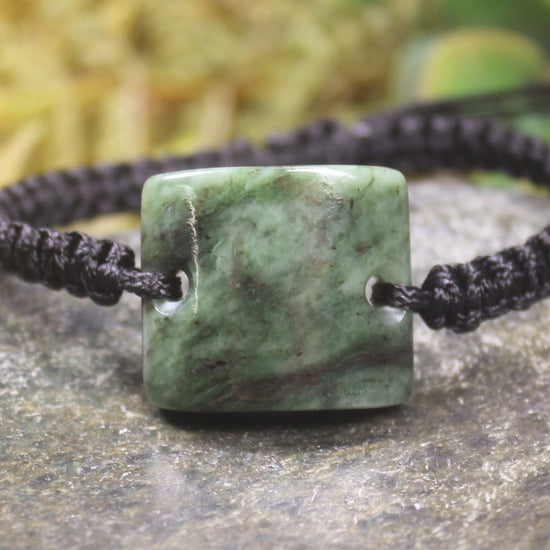 Adjustable cord bracelet with Hapopo Pounamu
