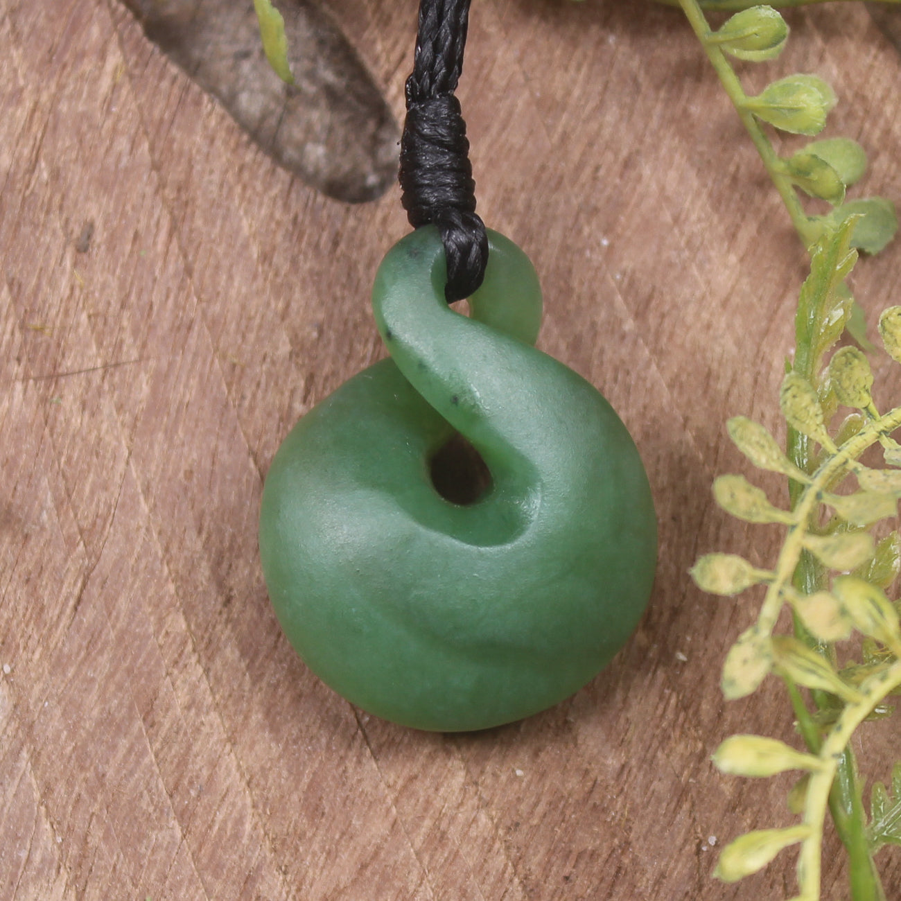 Twist or Pikorua carved from Hapopo Pounamu - NZ Greenstone