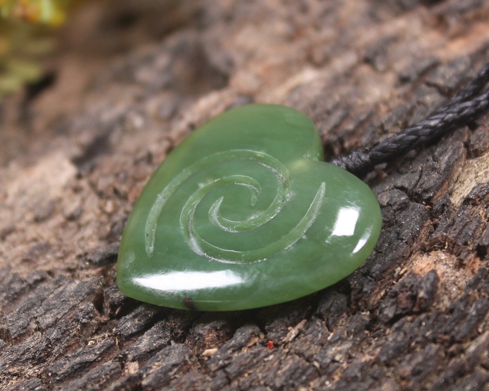 Koru Heart pendant carved from Hapopo Pounamu - NZ Greenstone