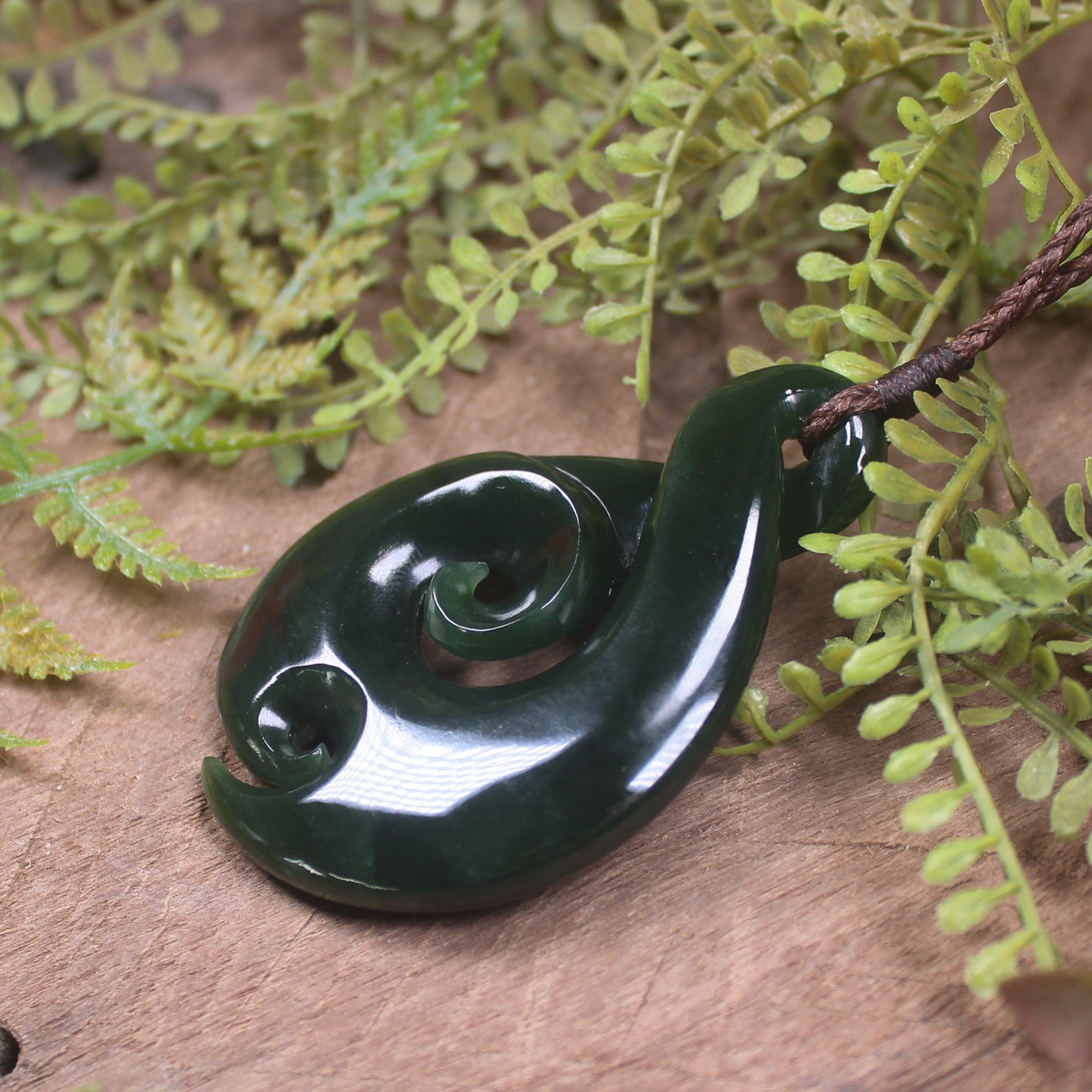 Koru Twist carved from Kawakawa Pounamu - NZ Greenstone