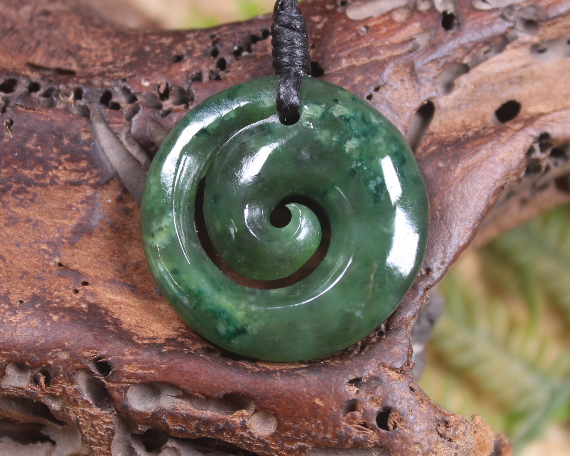 Koru pendant carved from Kawakawa Pounamu - NZ Greenstone