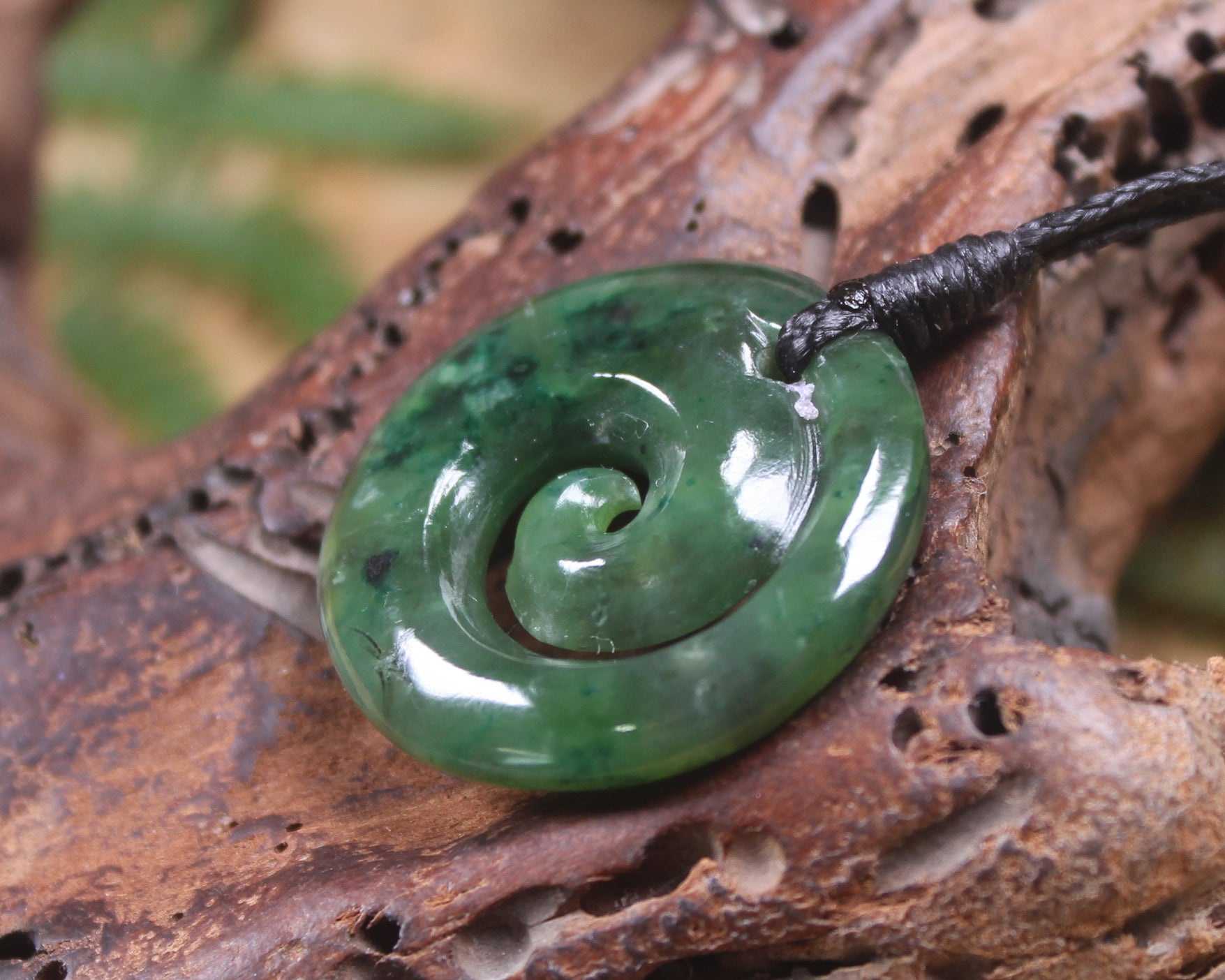 Koru pendant carved from Kawakawa Pounamu - NZ Greenstone