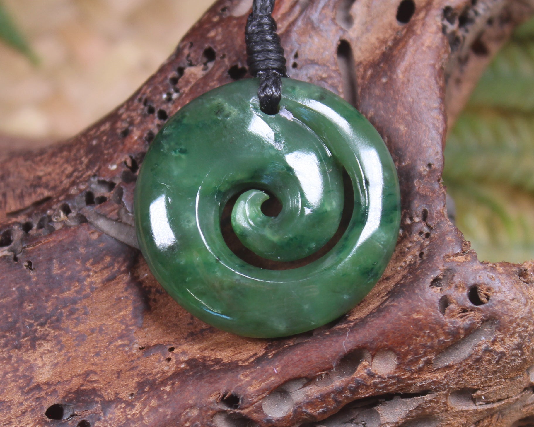 Koru pendant carved from Kawakawa Pounamu - NZ Greenstone