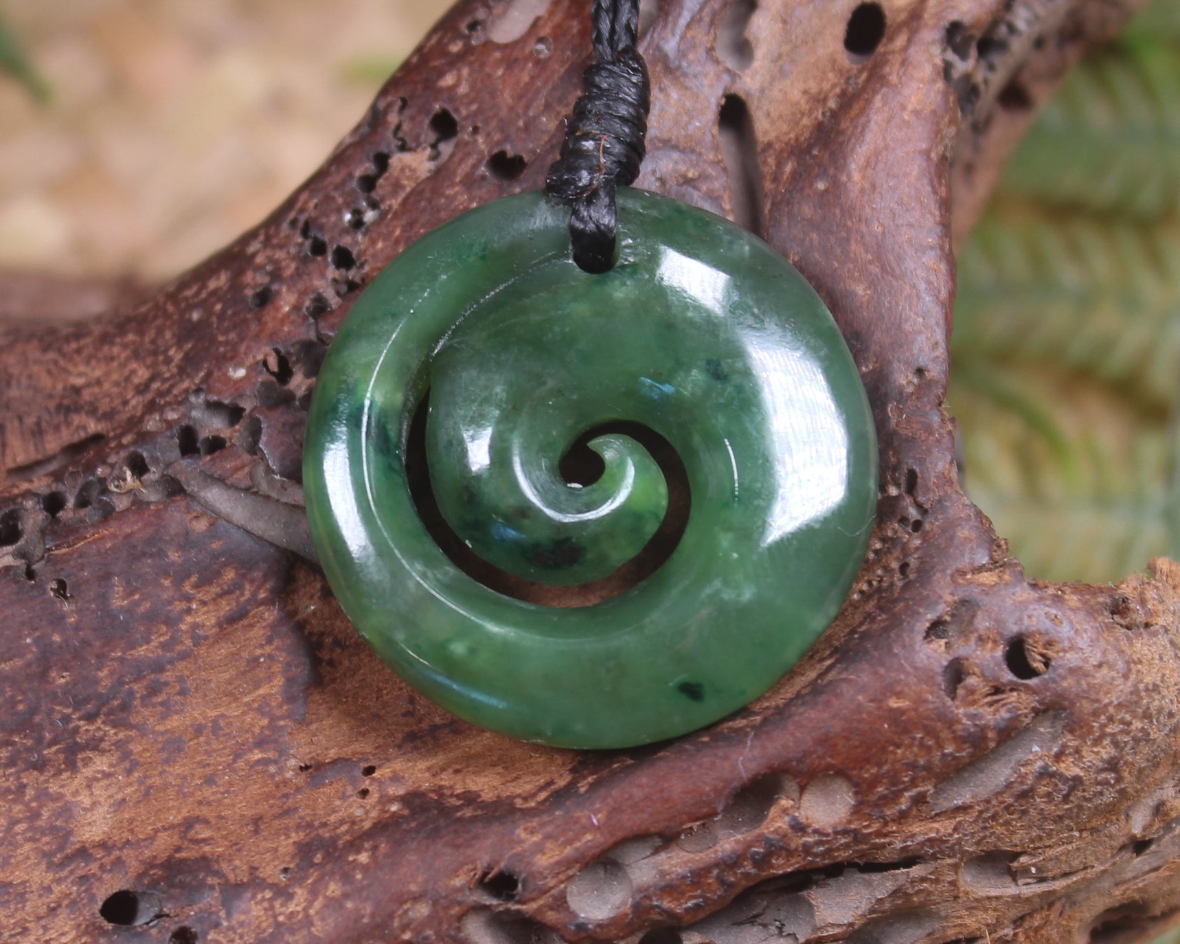 Koru pendant carved from Kawakawa Pounamu - NZ Greenstone