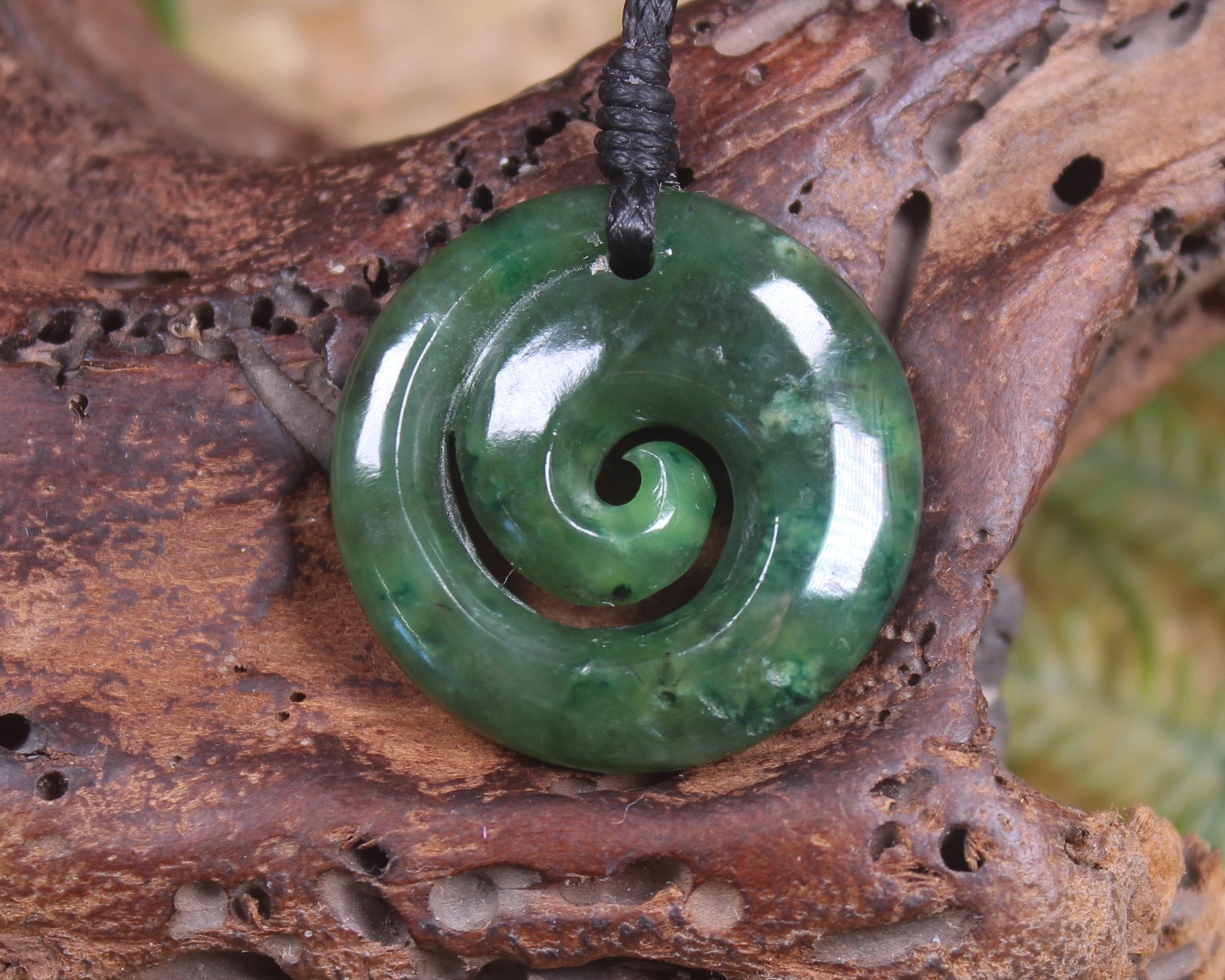 Koru pendant carved from Kawakawa Pounamu - NZ Greenstone