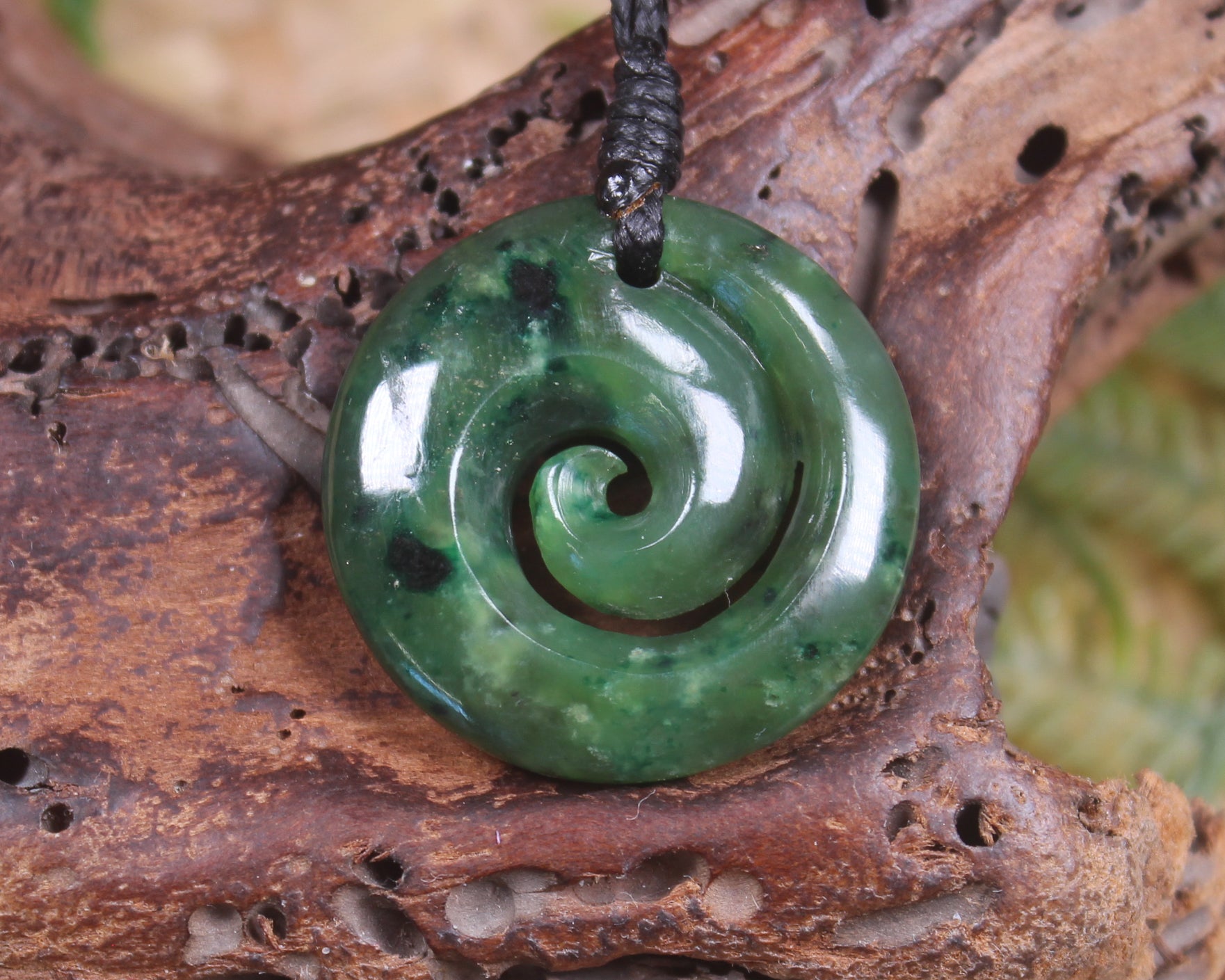 Koru pendant carved from Kawakawa Pounamu - NZ Greenstone