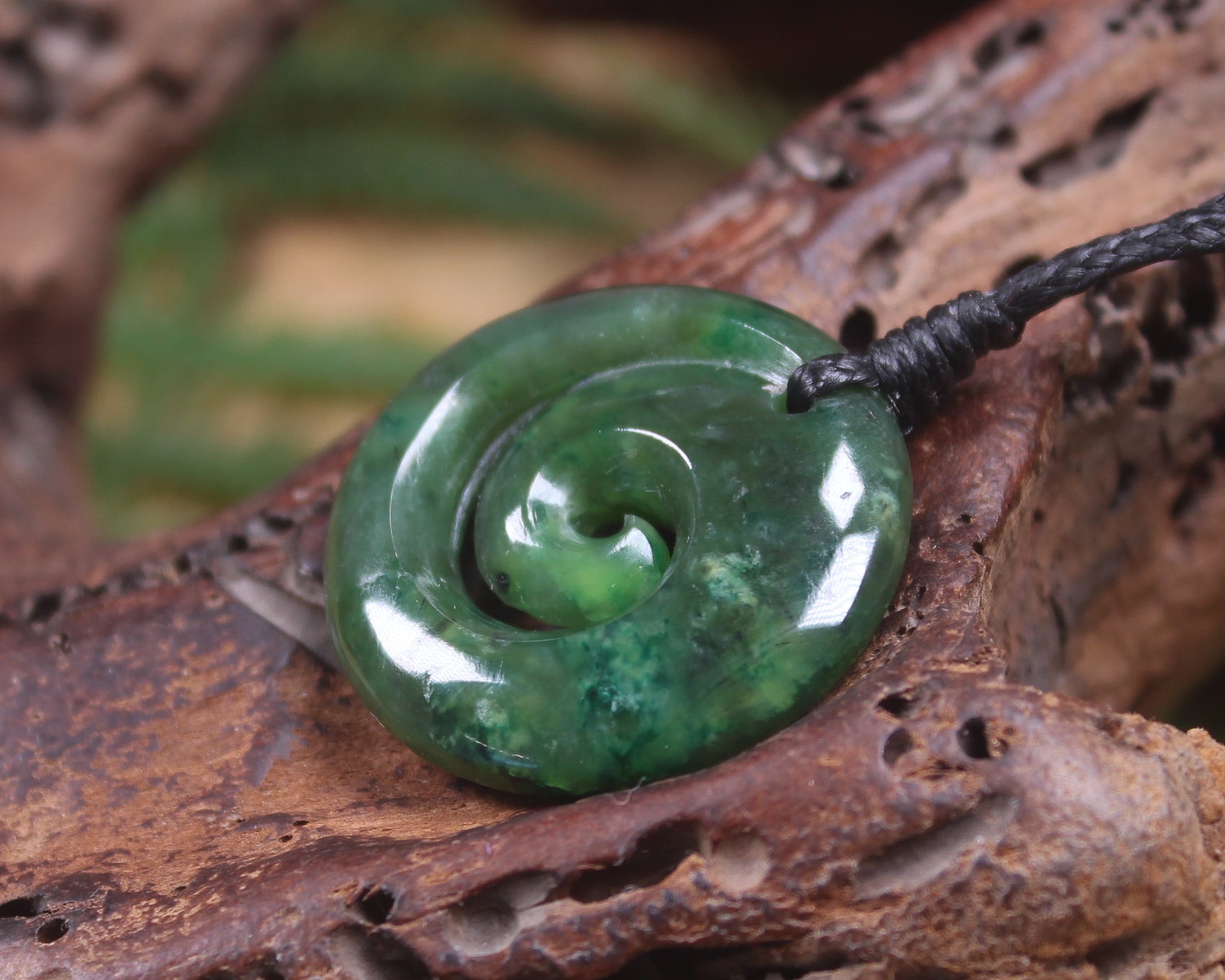 Koru pendant carved from Kawakawa Pounamu - NZ Greenstone